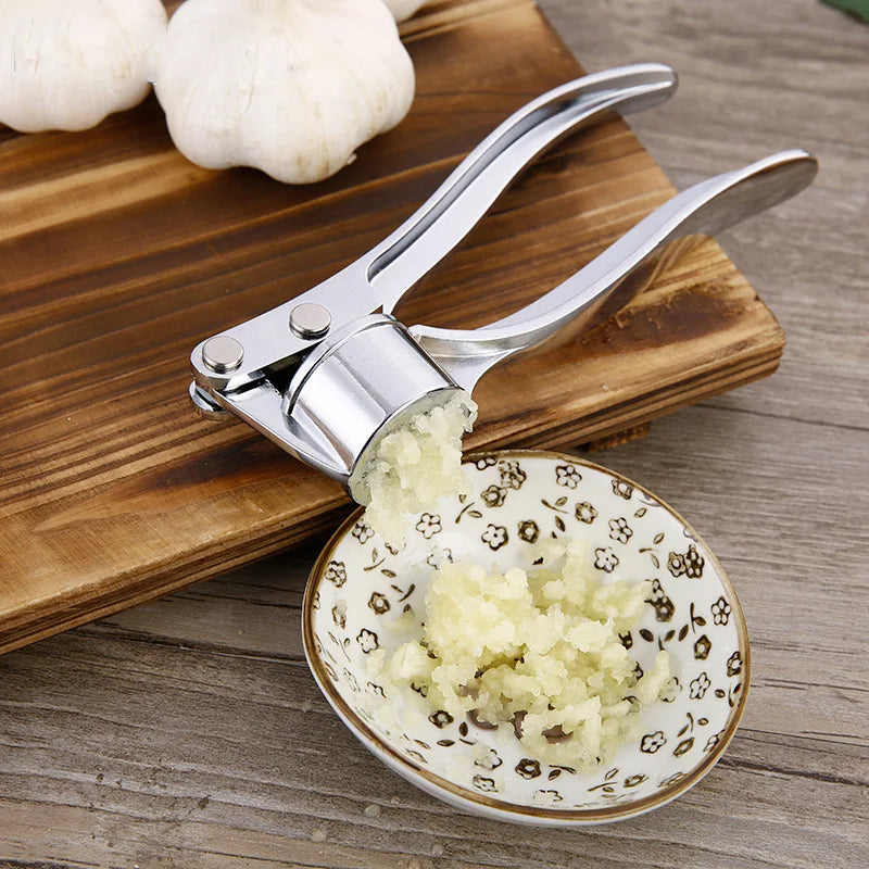 Stainless Steel Garlic Press Crusher – Manual Garlic Mincer & Squeezer for Kitchen Use