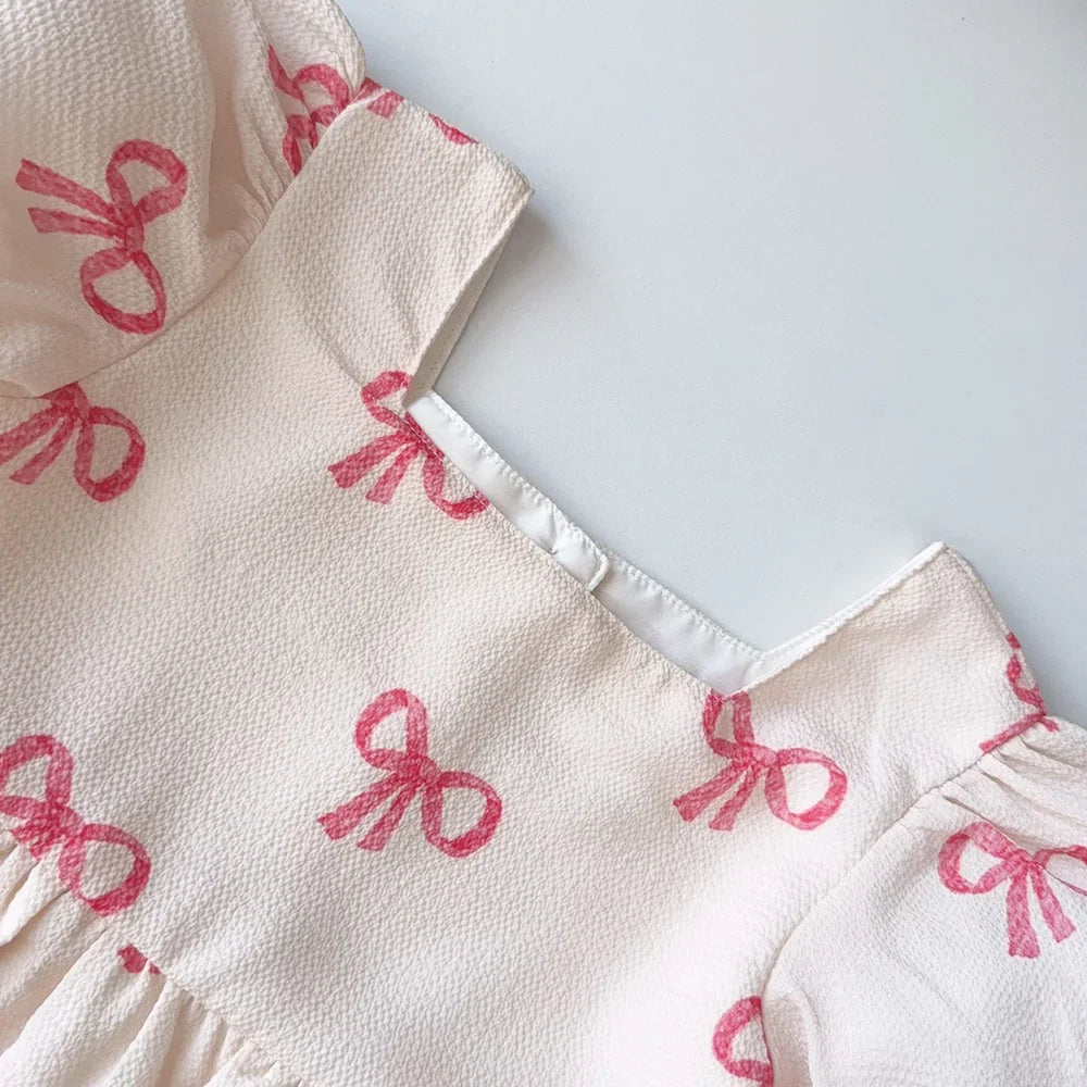 فستان صيفي للبنات من بير ليدر - فستان كاجوال بأكمام قصيرة مطبوع عليه فيونكة، مناسب للأعمار من 3 إلى 7 سنوات