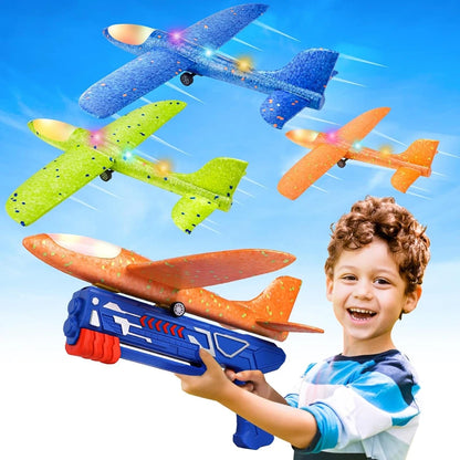 12.2" LED Foam Airplane Launcher Toy – Outdoor Flying Glider Catapult Gun for Kids Boys Birthday Gift