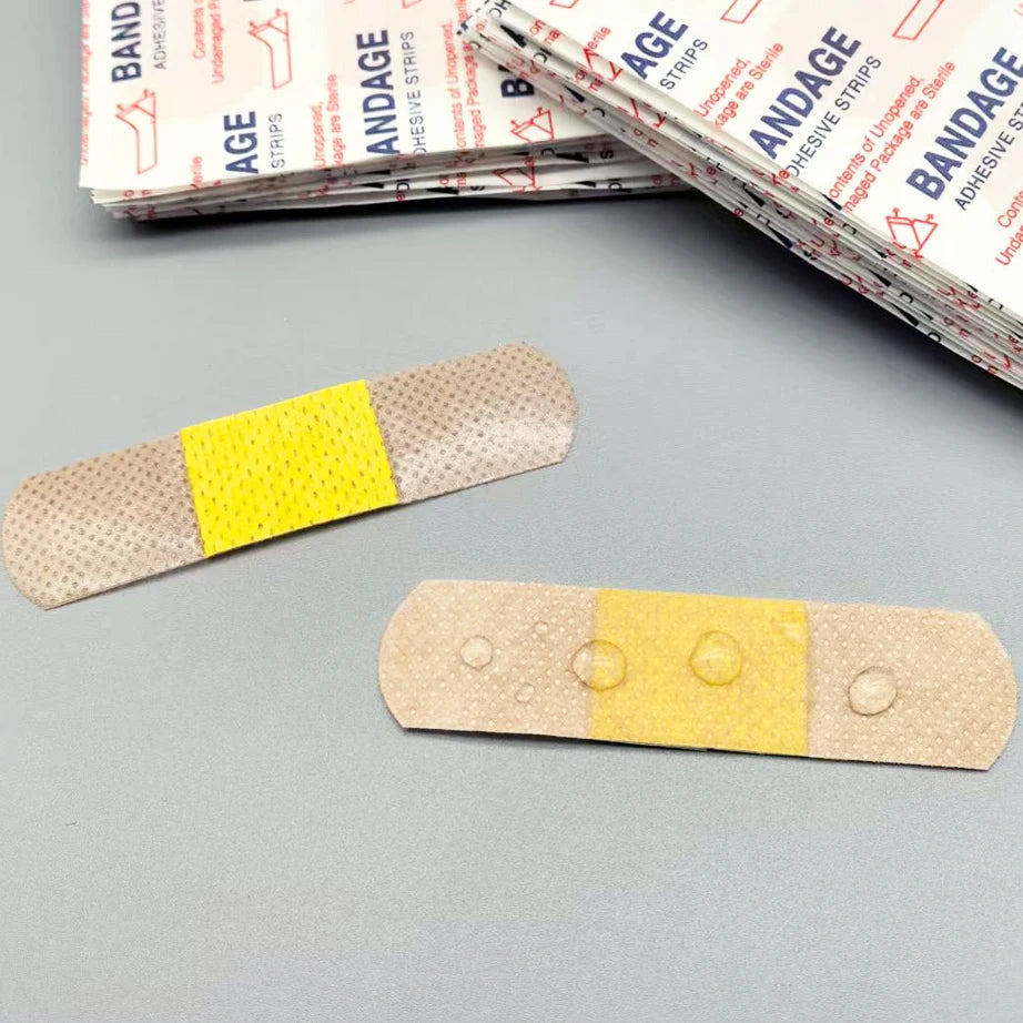 50/100 قطعة من ضمادات لاصقة مقاومة للماء وجيدة التهوية لوقف النزيف، ضمادات شاش طبي للإسعافات الأولية. 